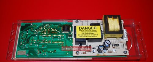 Part # WB27X5579, 164D3147G004 GE Oven Electronic Control Board And Clock (used, overlay fair)