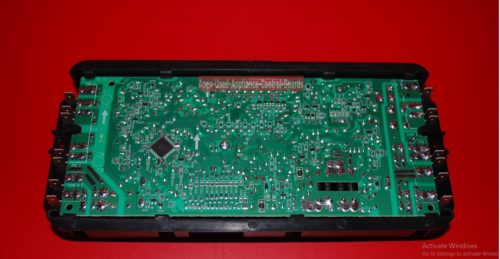Part # W10821267 Amana Oven Electronic Control Board (used. overlay good)