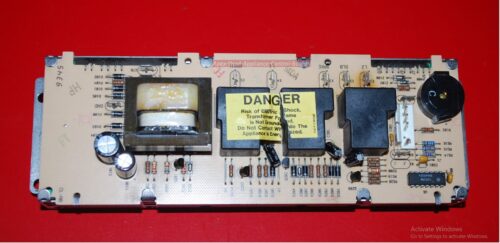 Part # 164D2677P003, WB27X5074 - GE Oven Electronic Control board (used, overlay good)