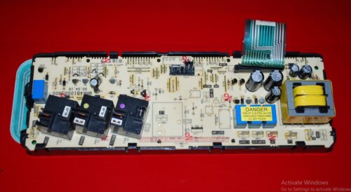 Part # WB27T10217, 164D4105P021 GE Oven Electronic Control Board And Touch Pad (used, overlay fair - Bisque)