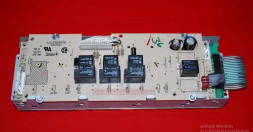 Part # 205C2194G006, WB27X5558, 205C2195G009 GE Oven Electronic Control Board (used, overlay fair - Almond)