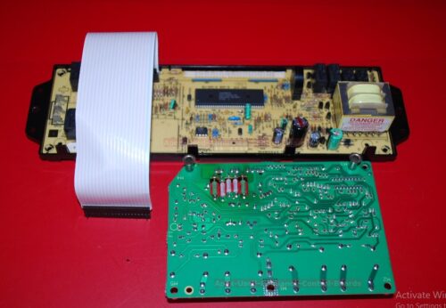 Part # W10110452, 9758080 Whirlpool Oven Electronic Control Board And Spark Module (used)